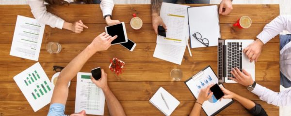 Group of busy business people working in office, top view Group of busy business people working in office, top view