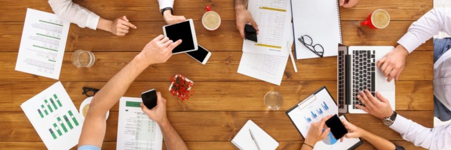 Group of busy business people working in office, top view Group of busy business people working in office, top view