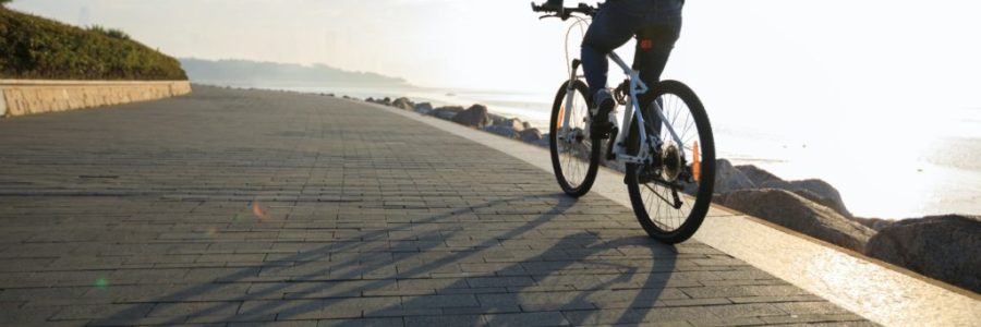 Riding bike on seaside Riding bike on seaside