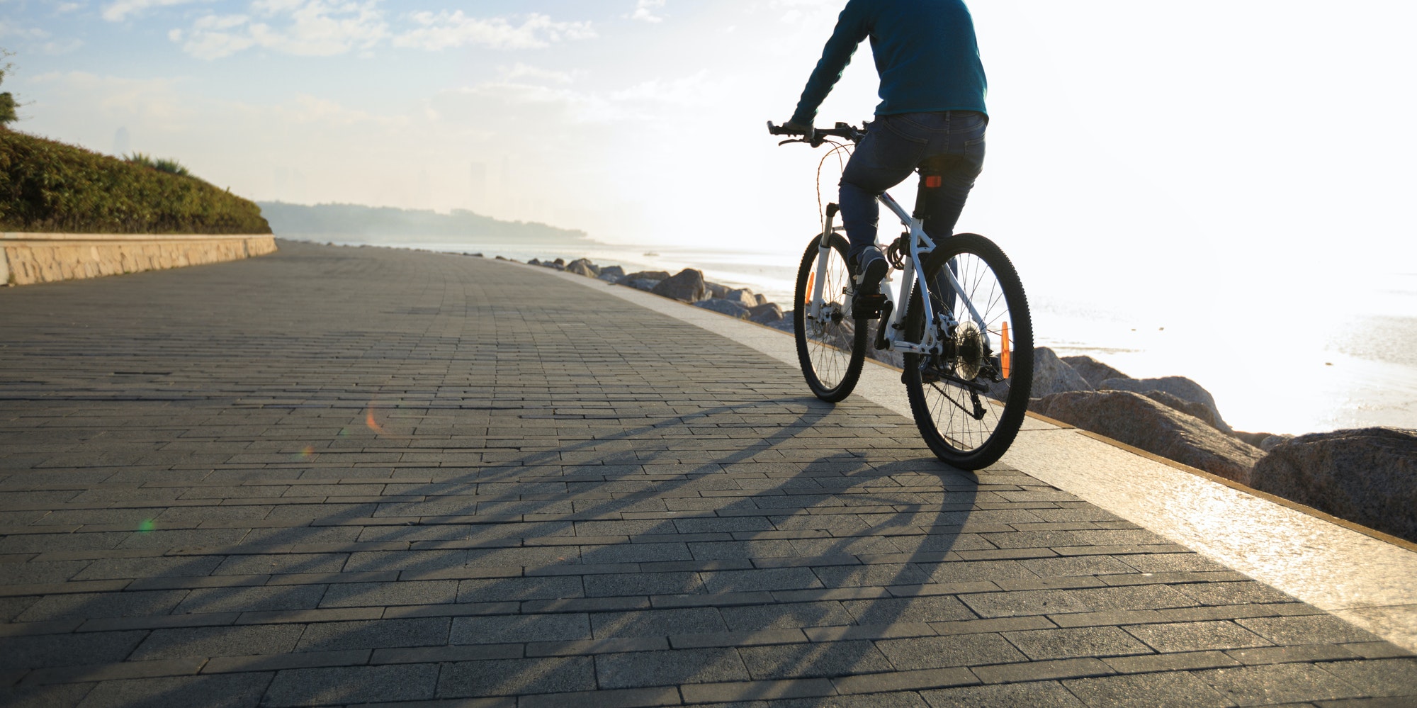 Riding bike on seaside