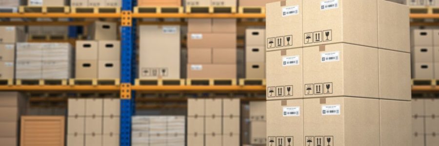Warehouse or storage with cardboard boxes on a pallet. Logistics and mail delivery concept. Warehouse or storage with cardboard boxes on a pallet. Logistics and mail delivery concept.