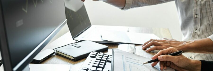 Business team investment working with computer, planning and analyzing graph stock market trading Business team investment working with computer, planning and analyzing graph stock market trading