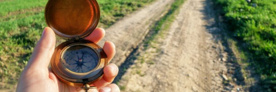 Man with compass in hand Man with compass in hand
